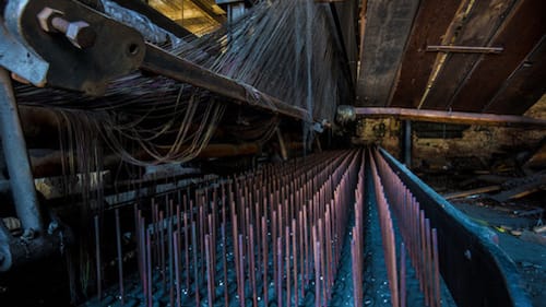 Shelley Koon's 'Loom I' shows the Scranton Lace Factory's 70-foot loom. (Photo courtesy of the artist.)