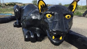 A 36-foot-long black panther made from repurposed car hoods by Don Kennell and Lisa Adler. (Image courtesy of A New View.)