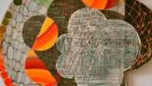 Straight's acrylic and knitted string on wood panel: From pure geometry into basic life forms.