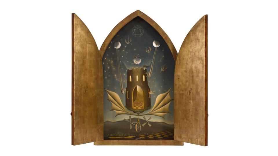 A wooden box like a cathedral window, shutters open, depicts a strange round tower floating on a unicycle & dragon-like wings