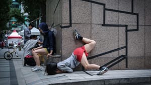 A 'Tape Riot' performer in Seoul, South Korea, interacts with the urban environment. (Photo by Anna Anderegg.)
