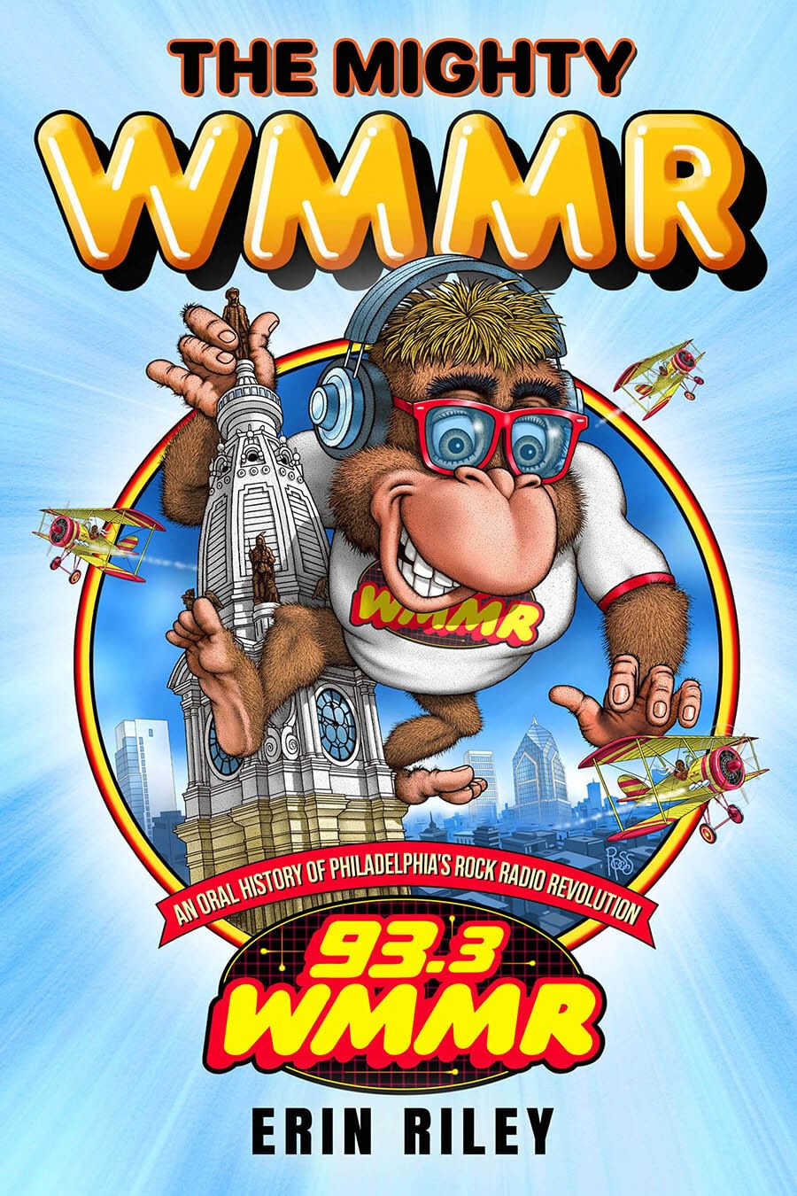 Title in ballooning orange letters, atop the cartoon logo of a giant, happy monkey swiping at planes around City Hall.