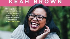 Book cover w/ The Pretty One prominent overlaying Brown, a Black woman, wearing a gray sweater, glasses, outdoors, smiling