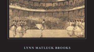 Book cover. Title in yellow script above a 19th-century illustration of ballerinas onstage in a packed theater with 4 tiers