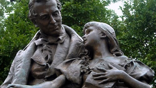 Daniel Chester French's 1889 sculpture of Thomas Hopkins Gallaudet teaching Alice Cogswell the manual letter "A" sits on Gallaudet University's campus. (Photo via Creative Commons/Wikimedia.)