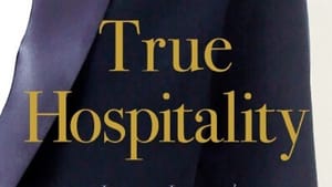 Book cover: title in gold over a close-up photo of a woman in a navy blazer with a gold pineapple pin on the lapel.