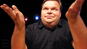 Mike Daisey plays his <em>'Trump Card.'</em> (Photo courtesy of FringeArts)