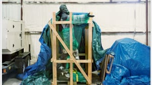 Banished to a cave of two-by-fours: photographer An-My Lê captures a new phase for the Jefferson Davis monument in New Orleans. (Image courtesy of the artist and Marian Goodman Galley.)