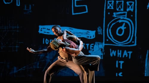 Two Black dancers: Johnson extends 1 arm & gracefully tips Guy back over his knee, against a black backdrop with blue doodles