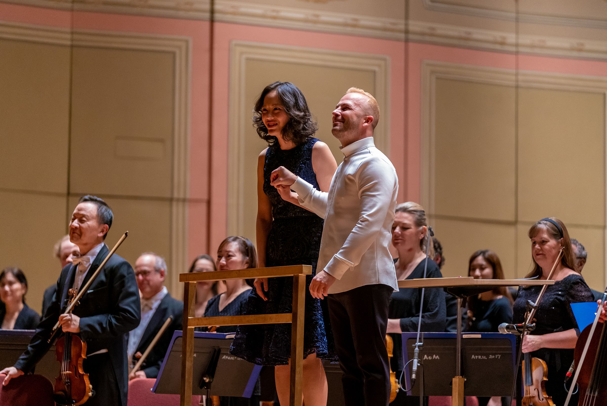 Philadelphia Orchestra Music Director Yannick Nézet-Séguin and Vivian Fung after the 2020 premiere of her ‘Dust Devils.’ Are these moments "extraordinary" or "groundbreaking"? (Photo by Jeff Fusco.)