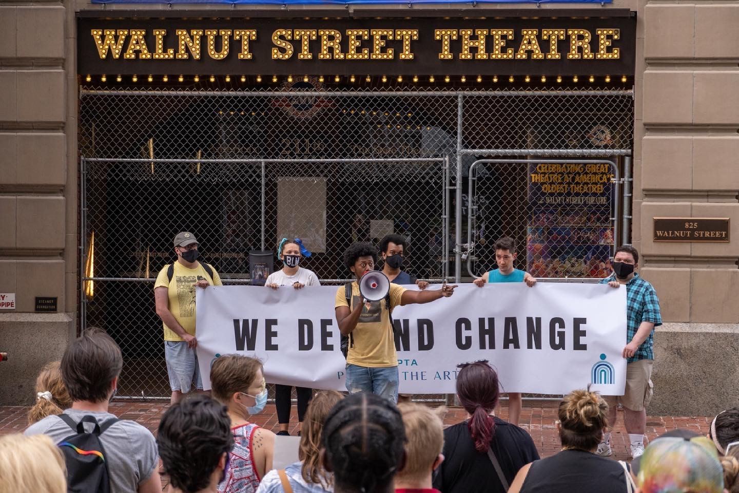 Protest co-organizer Garrick Morgan speaks to the crowd outside the Walnut on June 18. (Photo by Matthew Wright.)