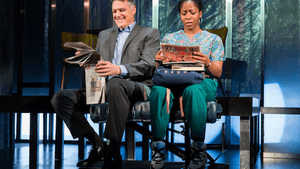 Robert Cuccioli -- the white guy on the bus -- and Danielle Leneé. (Photo by Matt Urban, Mobius New Media)