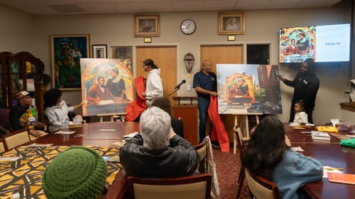 In a room at Temple University, three people unveil two renderings of the colorful William Still mural.