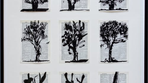 Kentridge's 'Nine Trees,' like his coffee-pot linotype, is printed on pages from the 'Shorter Oxford English Dictionary.' (Photo courtesy of the Arthur Ross Gallery.)