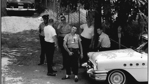 "Claksdale, Mississippi police pose for a photograph as ministers from the National Council of Churches march to the local church" (1963), by Danny Lyon. (Photo © Danny Lyon, New York & Magnum Photos, New York/Courtesy Edwynn Houk Gallery, New York.)