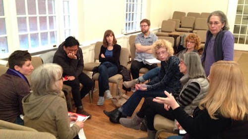 Annie Liontas (bottom left) leads a group of area writers in a discussion of NEA/NEH funding. (Photo by Alaina Mabaso)