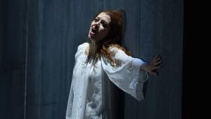 Lauren Snouffer's Agnès experiences a sudden, unwelcome awakening. (Photo by Kelly & Masse for Opera Philadelphia.)