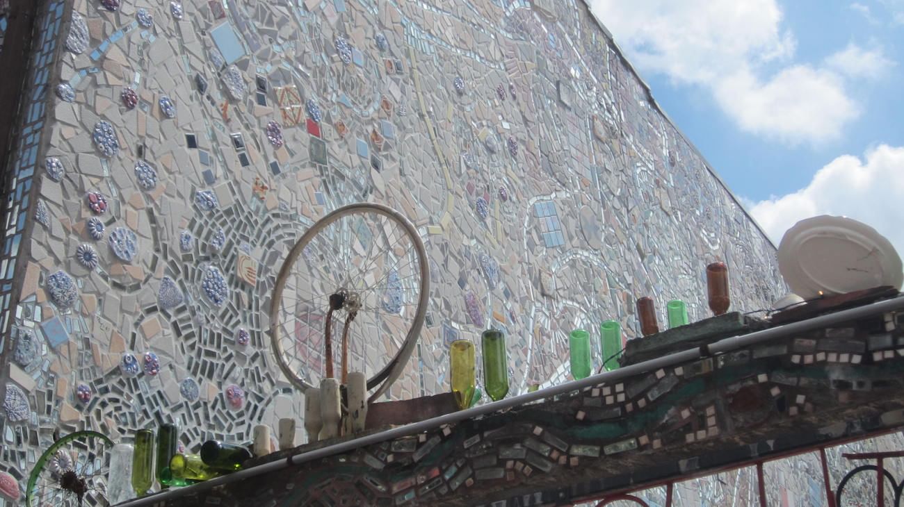 Philadelphia artist Isaiah Zagar frequently references the work of Marcel Duchamp in his outdoor mosaics. (Photo by AJ Sabatini.)