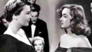 Davis (right) confronts Baxter: No escape in the spotlight.