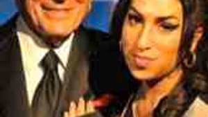 With Amy Winehouse: Imitating Billie Holiday, badly.