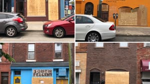 After a weekend in crisis across the city, boarded-up businesses line East Passyunk Avenue. (Photos by Alaina Johns.)