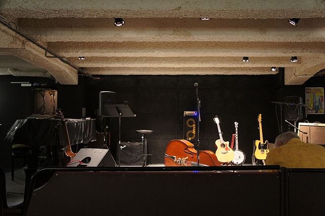 A stage filled with musical instruments, but no people
