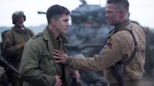 Hold on a minute, son: Lerman and Pitt in “Fury.” (Photo by Giles Keyte - © 2014 CTMG, Inc.)