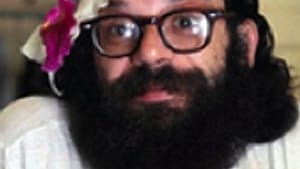 Even then, Ginsberg (above, with flower) claimed his place in history.