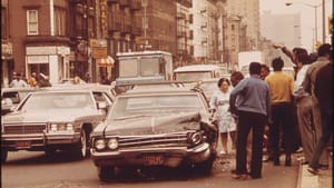 Belief systems crash. (“Harlem Traffic Accident,” Chester Higgins, 1973; National Archives)