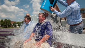 The president (right) and athletic director (left) of the University of Central Arkansas take part in the ALS ice bucket challenge. (Photo via Creative Commons/Flickr)