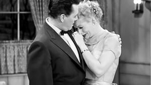 Ricky (Desi Arnaz) comforts Lucy (Lucille Ball) after yet another of her plots to escape her housewife existence meets an ignominious end.