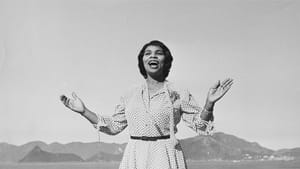 Marian Anderson sings with open arms in front of a mountainous backdrop. (Photo courtesy of Penn Libraries.)