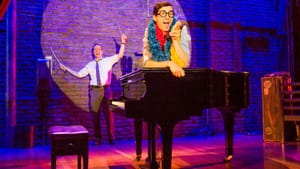 Two men and a piano. (Photo by Jim Cox)
