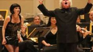 Hannigan (left) and Rattle channel Ligeti: Both a parody and a celebration.