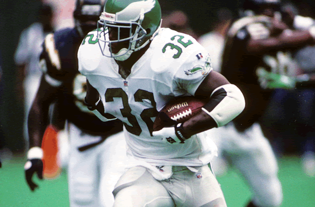For who? For what? Ricky Watters as an Eagle. (Photo via rickywatters.com)